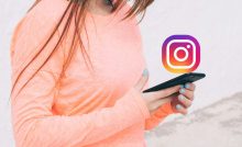 Ragazza con smartphone funzione Instagram